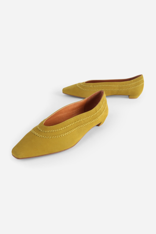INTENTIONALLY __________. Lofty Snipped Toe Ballet Flat