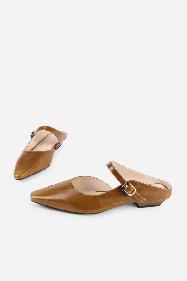 INTENTIONALLY __________. Nona Leather Flat Mule