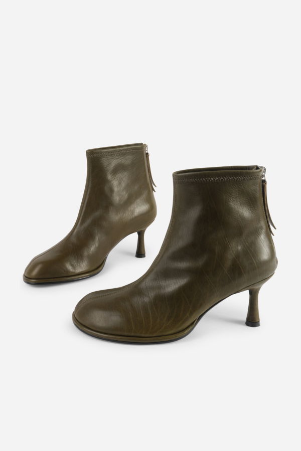 INTENTIONALLY __________. Powerhouse Stiletto Heel Ankle Boot