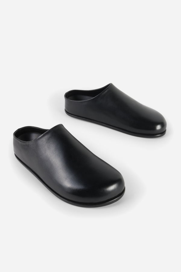 INTENTIONALLY __________. Ago Leather Mule - Black