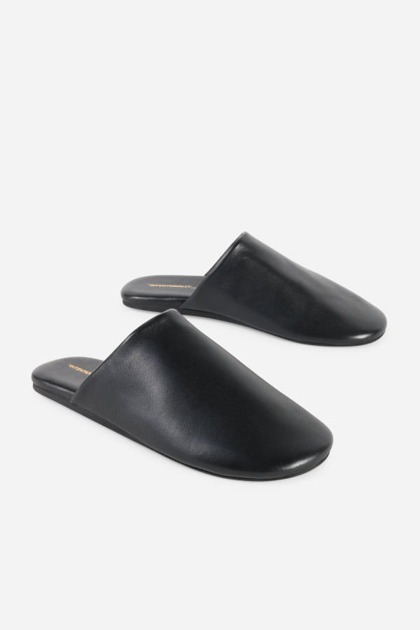INTENTIONALLY __________. Kuhl Leather Mule