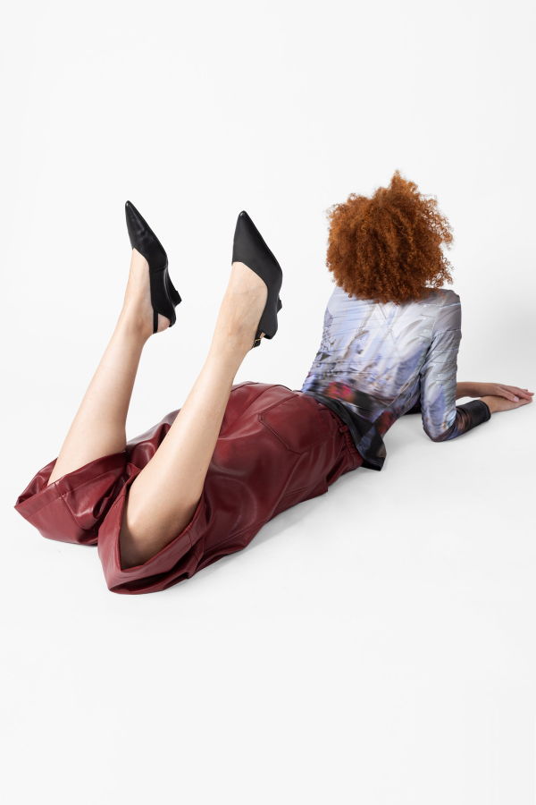 INTENTIONALLY __________. Lift Micro Wedge Slingback Heel