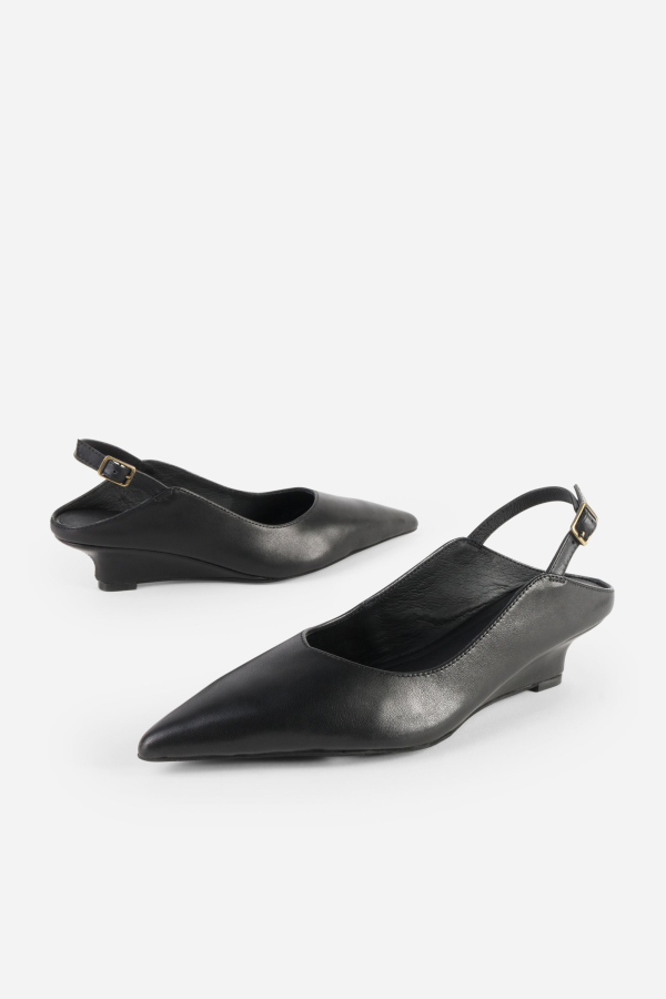 INTENTIONALLY __________. Lift Micro Wedge Slingback Heel