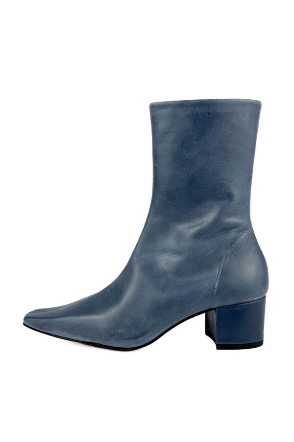 "INTENTIONALLY __________." Carlton Heeled Mid Boot