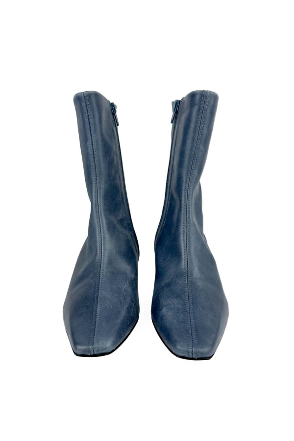 "INTENTIONALLY __________." Carlton Heeled Mid Boot