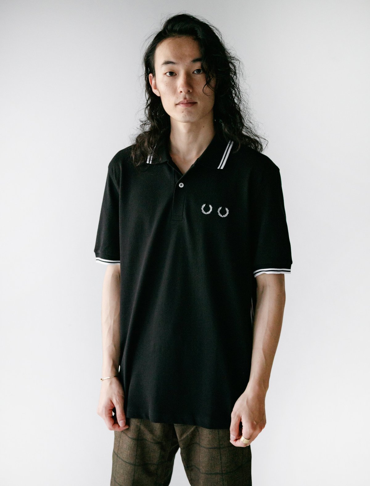 COMME des Garçons Gives the Fred Perry Polo a Neon Jolt