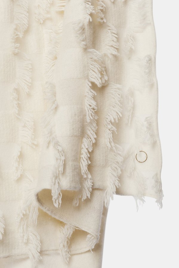 Oyuna Seren Knitted Hand Cut Fringed Cashmere Throw - Ivory Oyuna Seren Knitted Hand Cut Fringed Cashmere Throw - Ivory