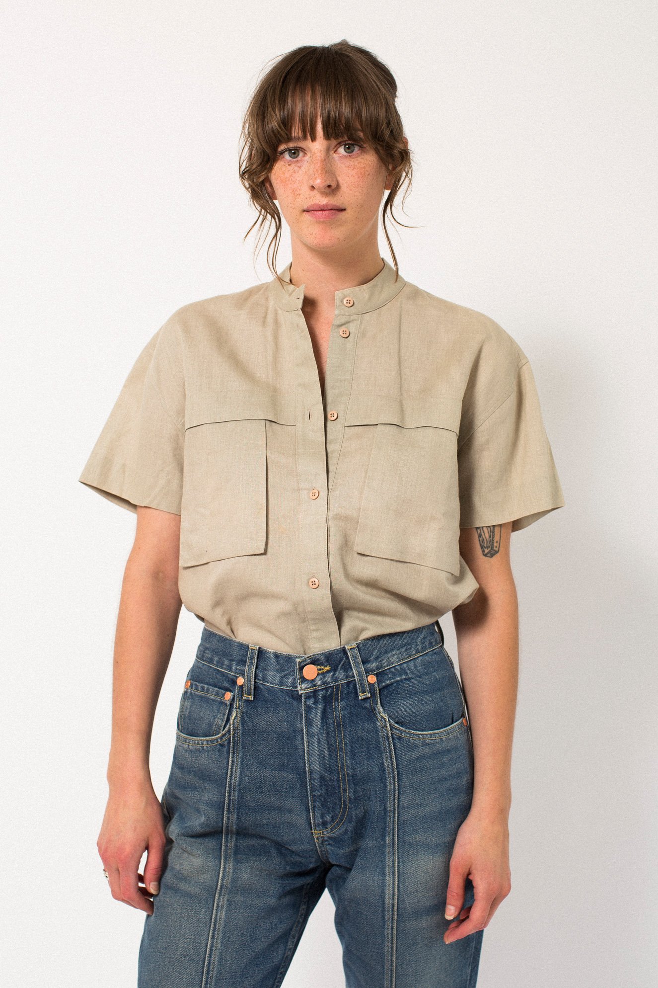 tan button up blouse