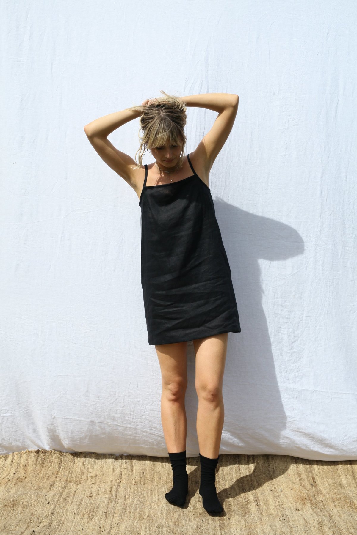 knee length dresses for ladies Lucy Black Strappy Mini Dress With Ruffle Trim – Club L London main image 1