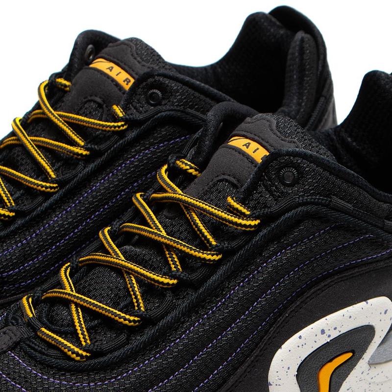 nike air skarn black university gold