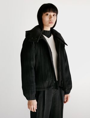 Pleats Please Reversible Pleats Down Jacket - Black | Garmentory