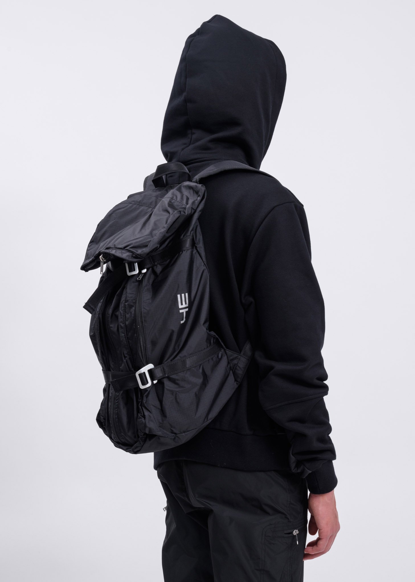 Heliot Emil Hiking Poncho Backpack - Black | Garmentory