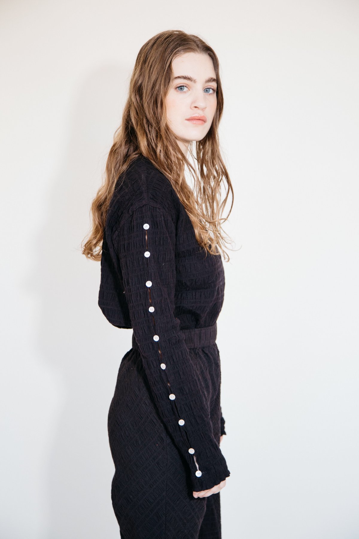 Nikki Chasin SIMA CREWNECK - BLACK CRINKLE - Image 1 of 4