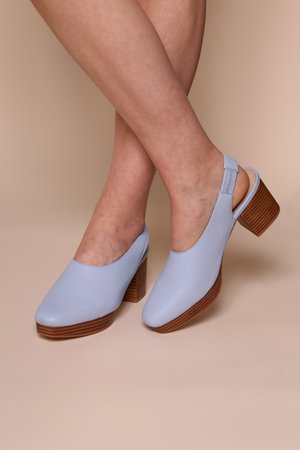 "INTENTIONALLY __________." Lotus Heel "INTENTIONALLY __________." Lotus Heel