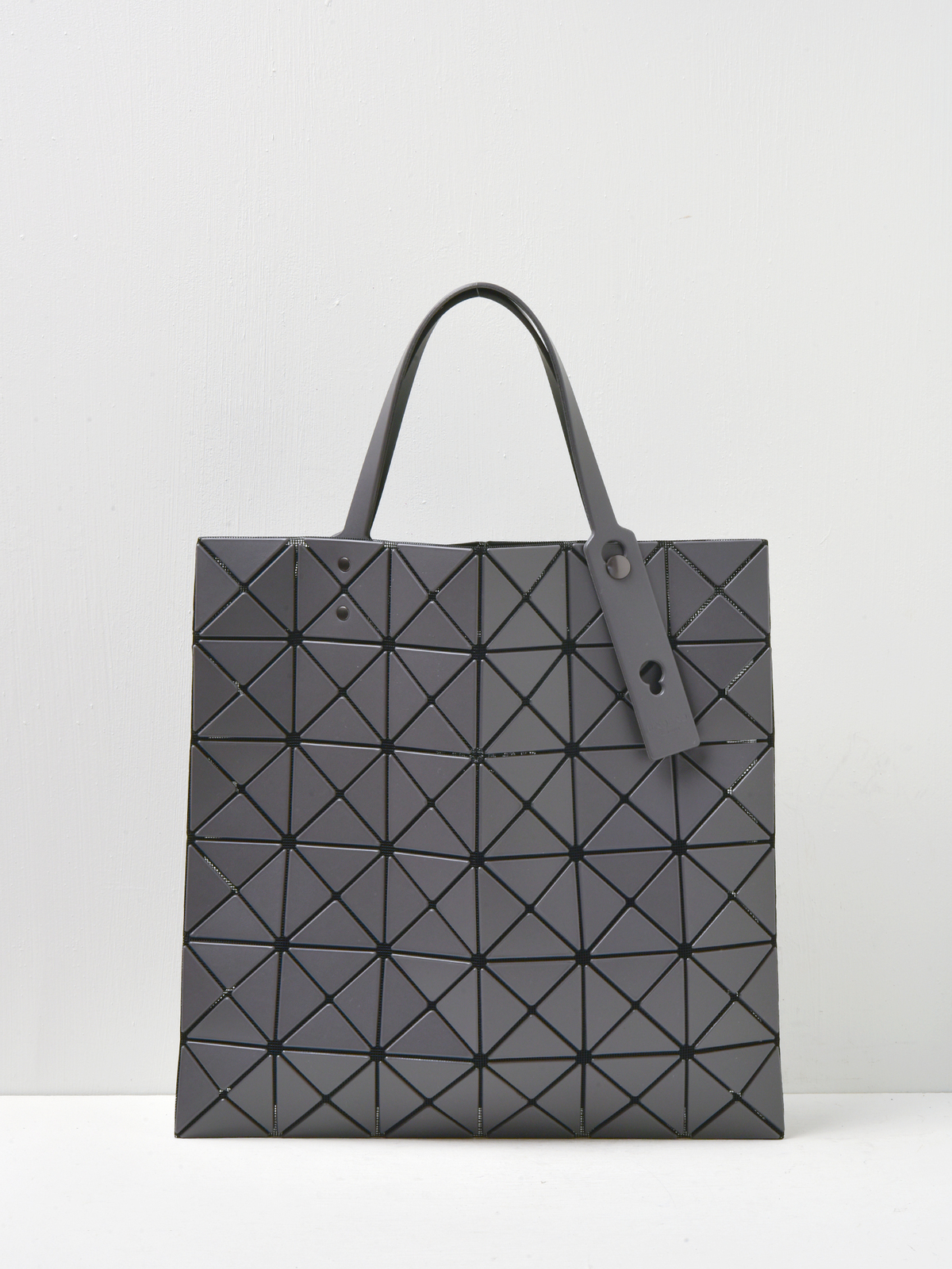 BAO BAO ISSEY MIYAKE LUCENT - METALLIC CHARCOAL GRAY | Garmentory