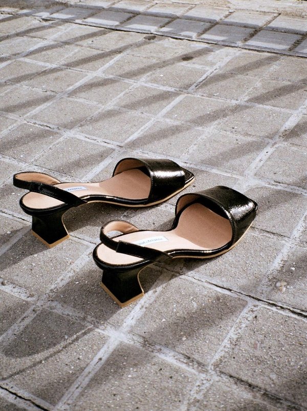 About Arianne Joan Patent Black About Arianne Joan Patent Black
