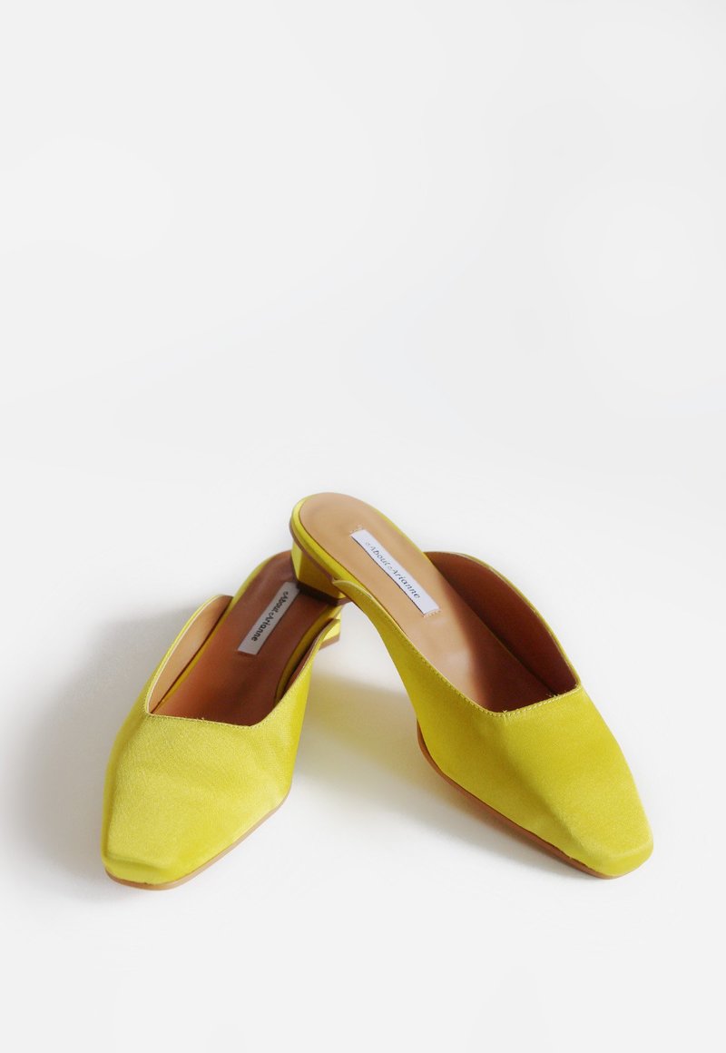 About Arianne Cassini Mules - Citrus