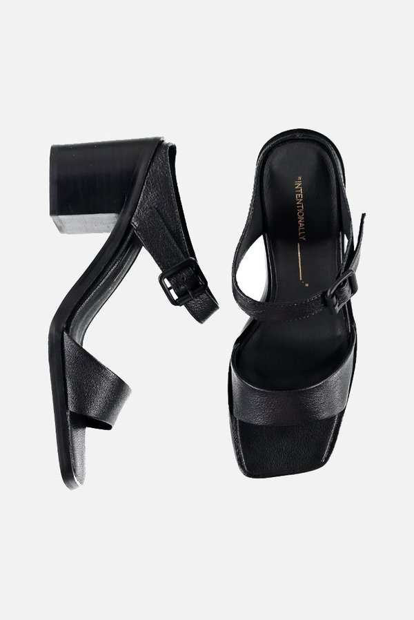 "INTENTIONALLY __________." Impo Sandal "INTENTIONALLY __________." Impo Sandal