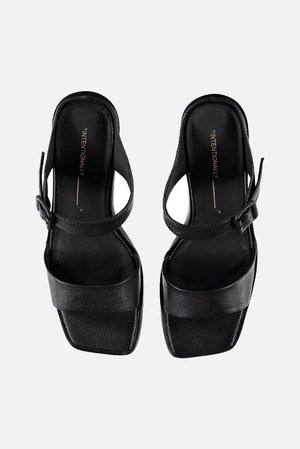 "INTENTIONALLY __________." Impo Sandal "INTENTIONALLY __________." Impo Sandal