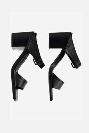 "INTENTIONALLY __________." Impo Sandal "INTENTIONALLY __________." Impo Sandal