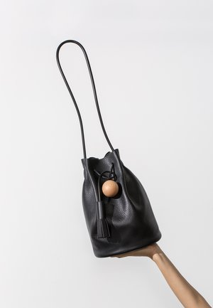 Building Block Bucket Bag - Pebbled Black | Garmentory