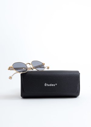 Études Studio Liberté Sunglasses With Chain Études Studio Liberté Sunglasses With Chain