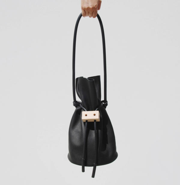 Building Block Cable Outlet Bag - Black | Garmentory 