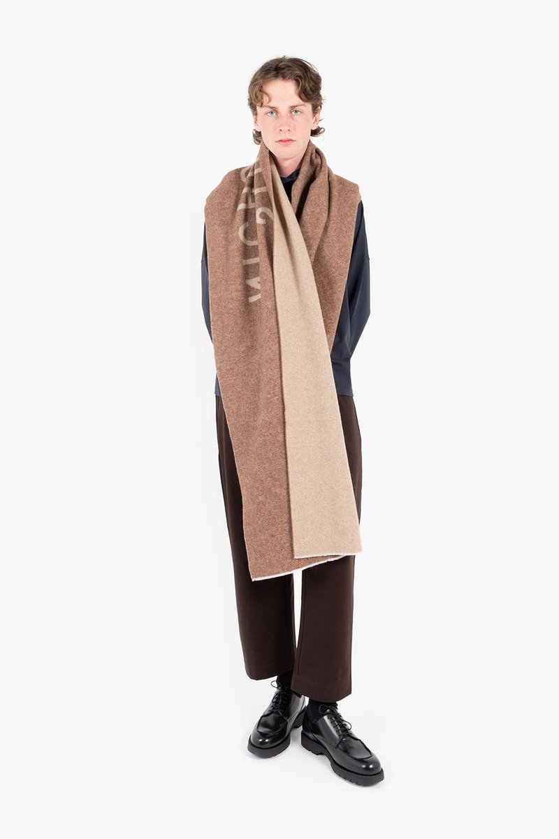 マフラー/ショール STUDIO NICHOLSON WOOL THE LOGO SCARF Studio Nicholson Logo Scarf - Tan/Camel | Garmentory