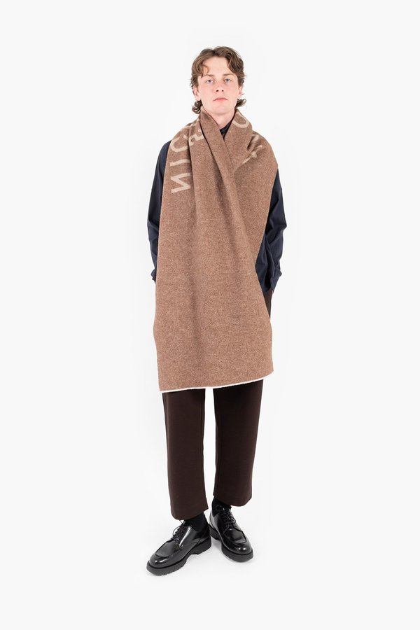 マフラー/ショール STUDIO NICHOLSON WOOL THE LOGO SCARF Studio Nicholson Logo Scarf - Tan/Camel | Garmentory