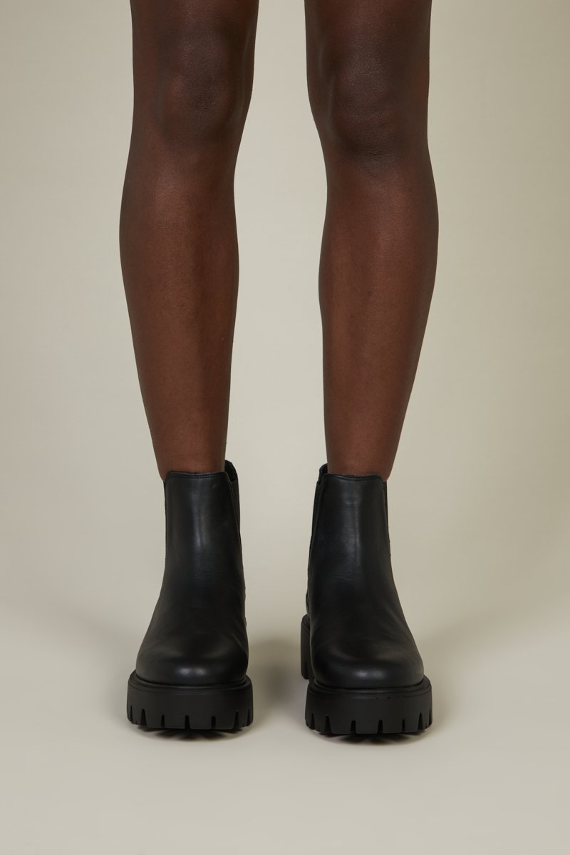 "INTENTIONALLY __________." Alex Boots Black Garmentory