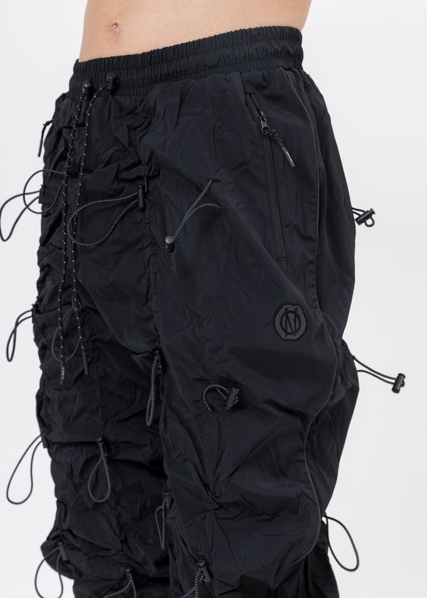99%is Reflective GOBCHANG Pants - Black | Garmentory