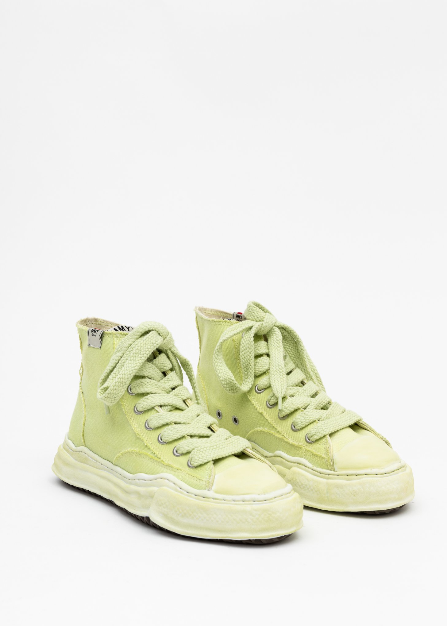 green tag sneakers