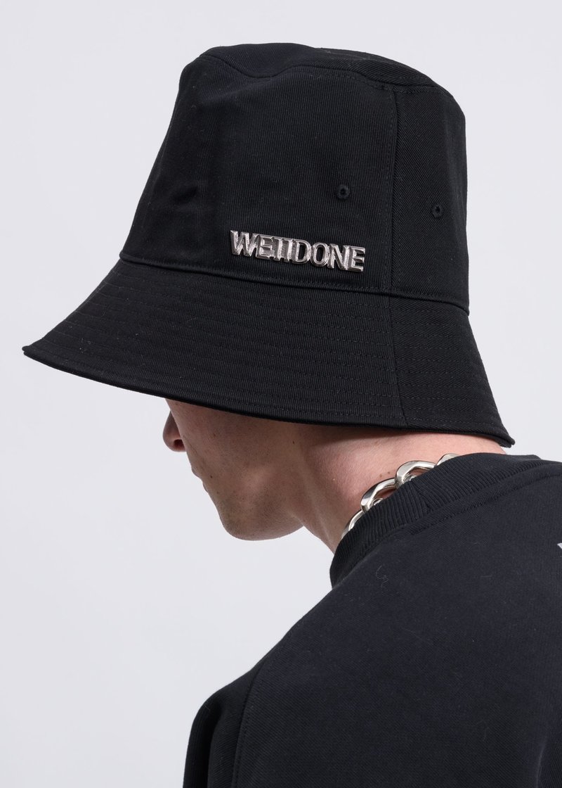 We11done  Metal Logo Bucket Hat in Black. we11done Metal Logo Bucket Hat - Black | Garmentory main image 4