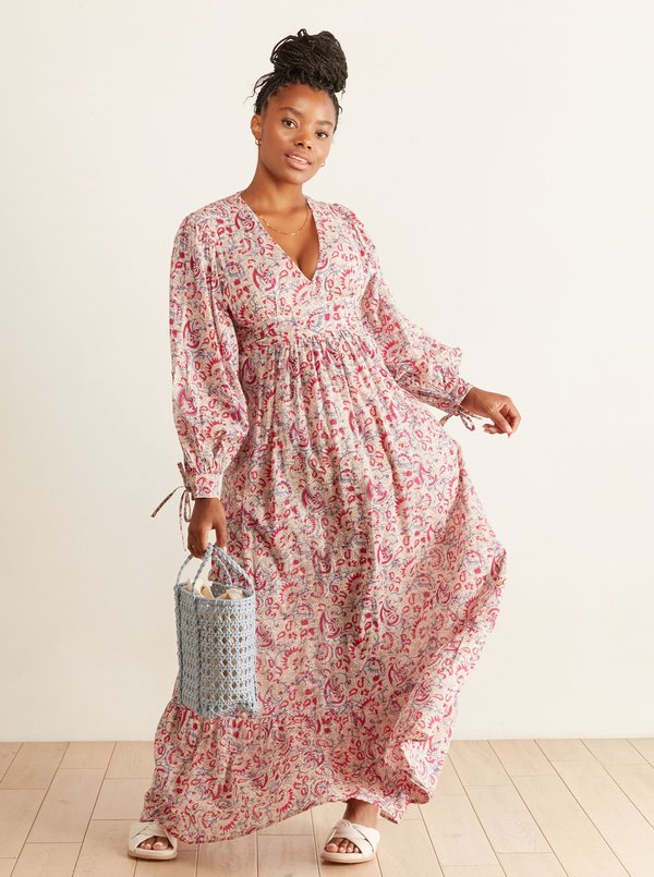 batik long dress design This batik dress is perfect for summer events and formal occasions. With its unique hand-stamped batik design and 100% cotton fabric, this dress is a stylish and comfortable choice for any event
