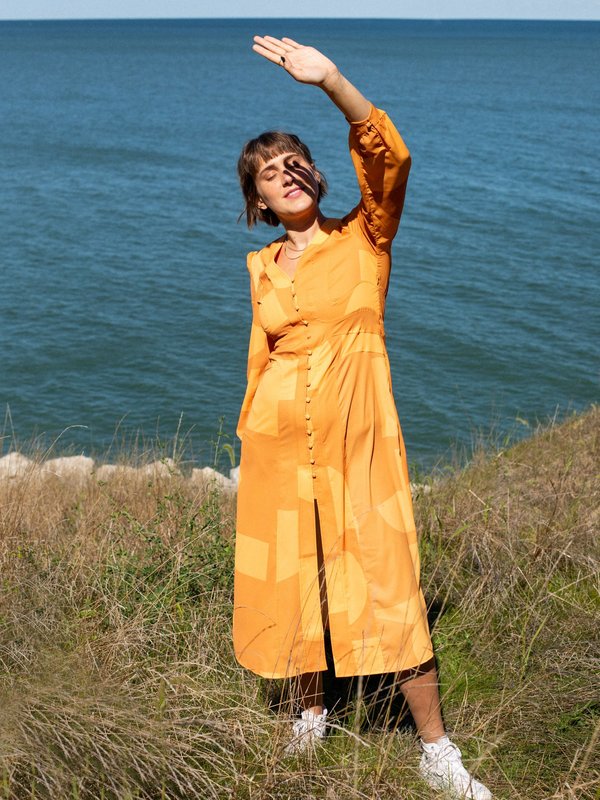 house of sunny orange dress House Of Sunny The Goldfish Hockney Knit Midi Dress