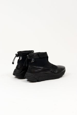 Guillermo Bravo "La Pola" High-Top, All Black. Guillermo Bravo "La Pola" High-Top, All Black.