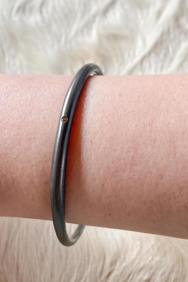 Oxidized Silver Tapered Bangle with Autumn Diamond Oxidized Silver Tapered Bangle with Autumn Diamond