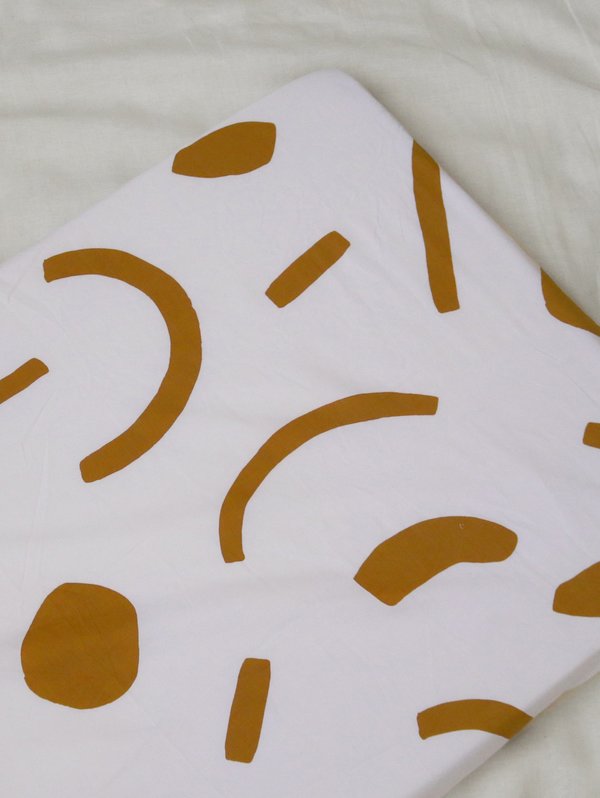 Mosey Me Shapes Fitted Cot Sheet in Tan - Sample Mosey Me Shapes Fitted Cot Sheet in Tan - Sample