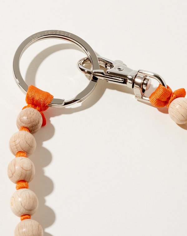 Perlen Long Keyholder in Natural on Orange Perlen Long Keyholder in Natural on Orange