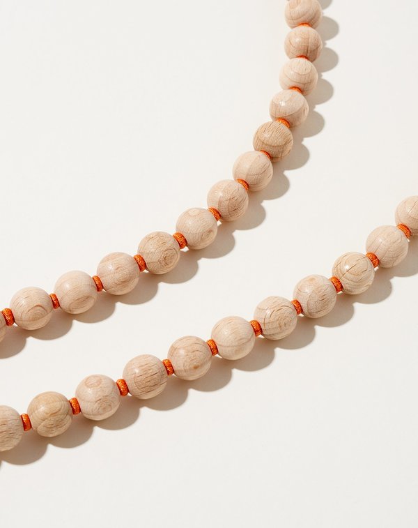 Perlen Long Keyholder in Natural on Orange Perlen Long Keyholder in Natural on Orange