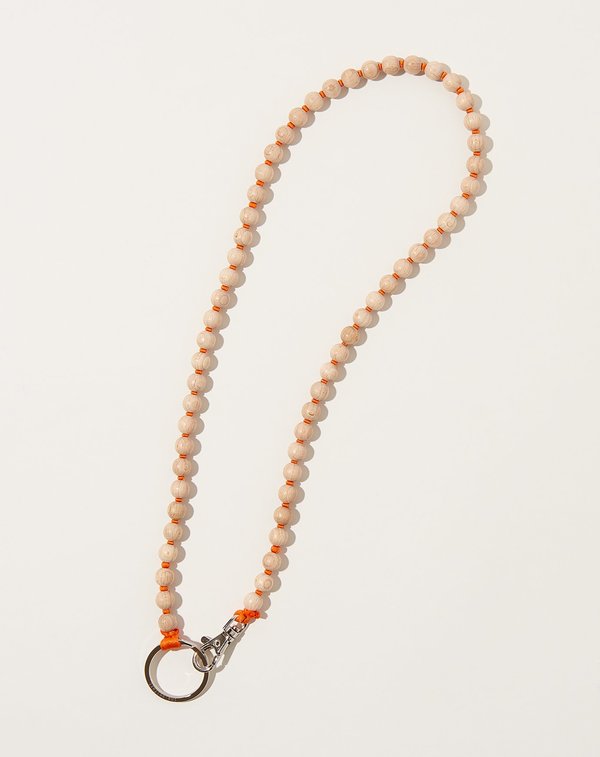 Perlen Long Keyholder in Natural on Orange Perlen Long Keyholder in Natural on Orange