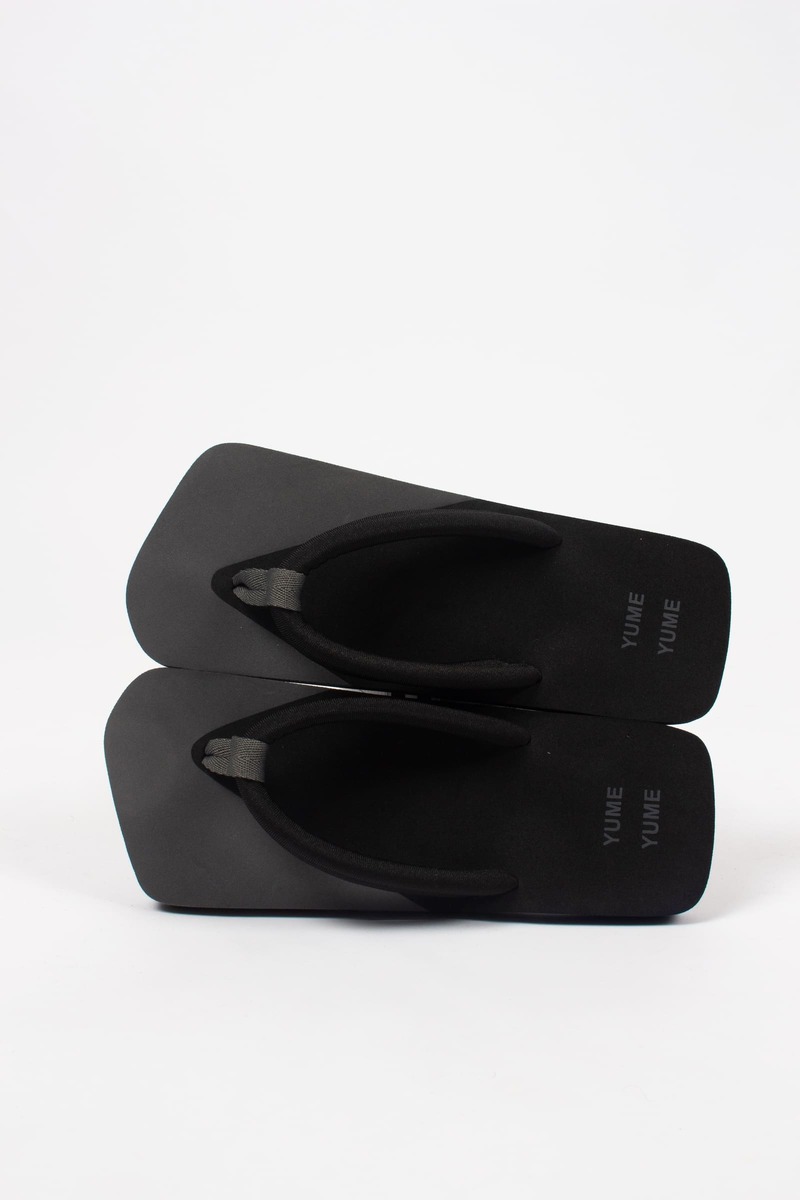 【YUME YUME】 XIGY ASPHALT Yume Yume Xigy Flip Flops - Asphalt Black | Garmentory