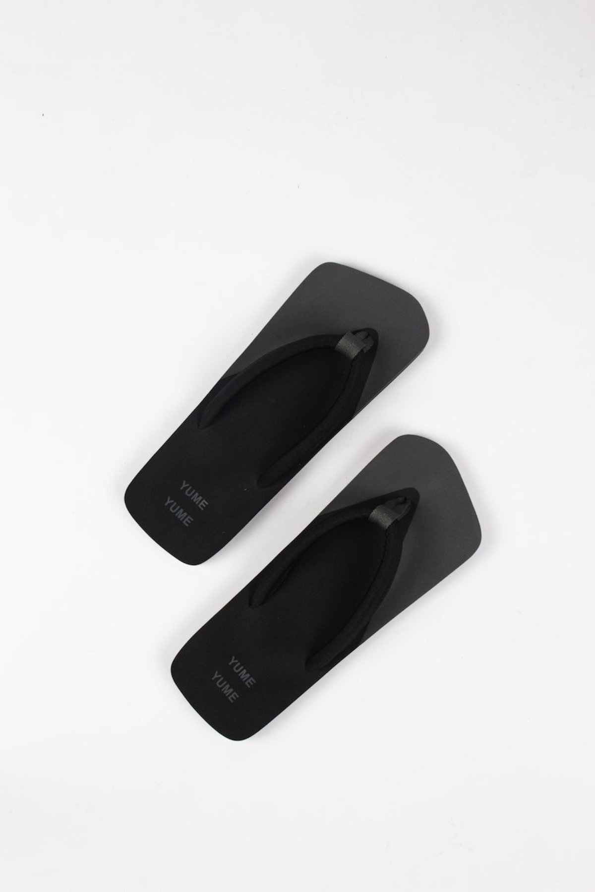 【YUME YUME】 XIGY ASPHALT Yume Yume Xigy Flip Flops - Asphalt Black | Garmentory