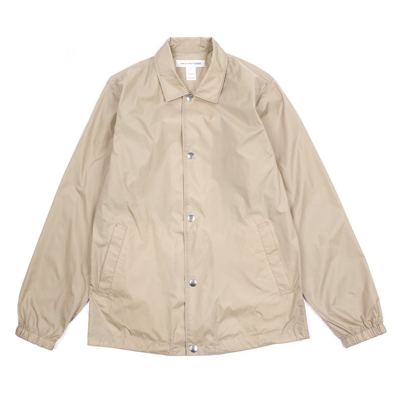 Comme Des Garcons Yue Minjun Printed Coach Jacket Beige Garmentory - Main Image