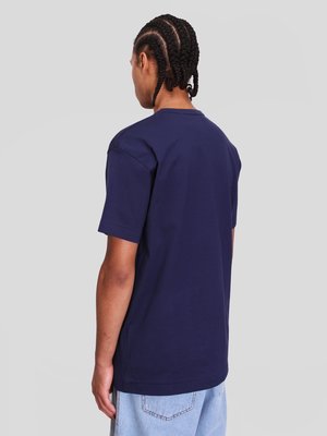 Comme des Garçons Play Logo T-Shirt - Navy Comme des Garçons Play Logo T-Shirt - Navy
