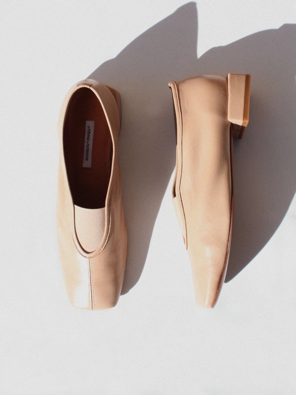 About Arianne Gillian Flats -  Sepia