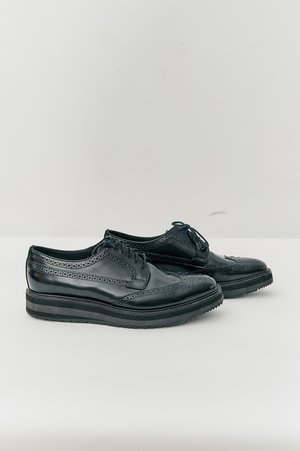 PRE-LOVED Prada Wingtip Oxford Shoes - BLACK | Garmentory display picture 1