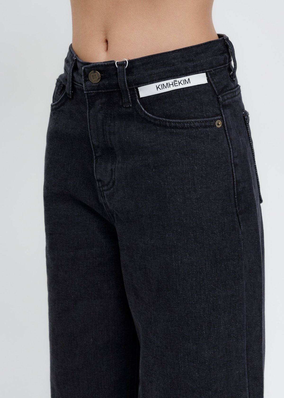 【KIMHEKIM】Giant Label Flare Jeans Black KIMHĒKIM Label Wide Fit Jeans - Black | Garmentory