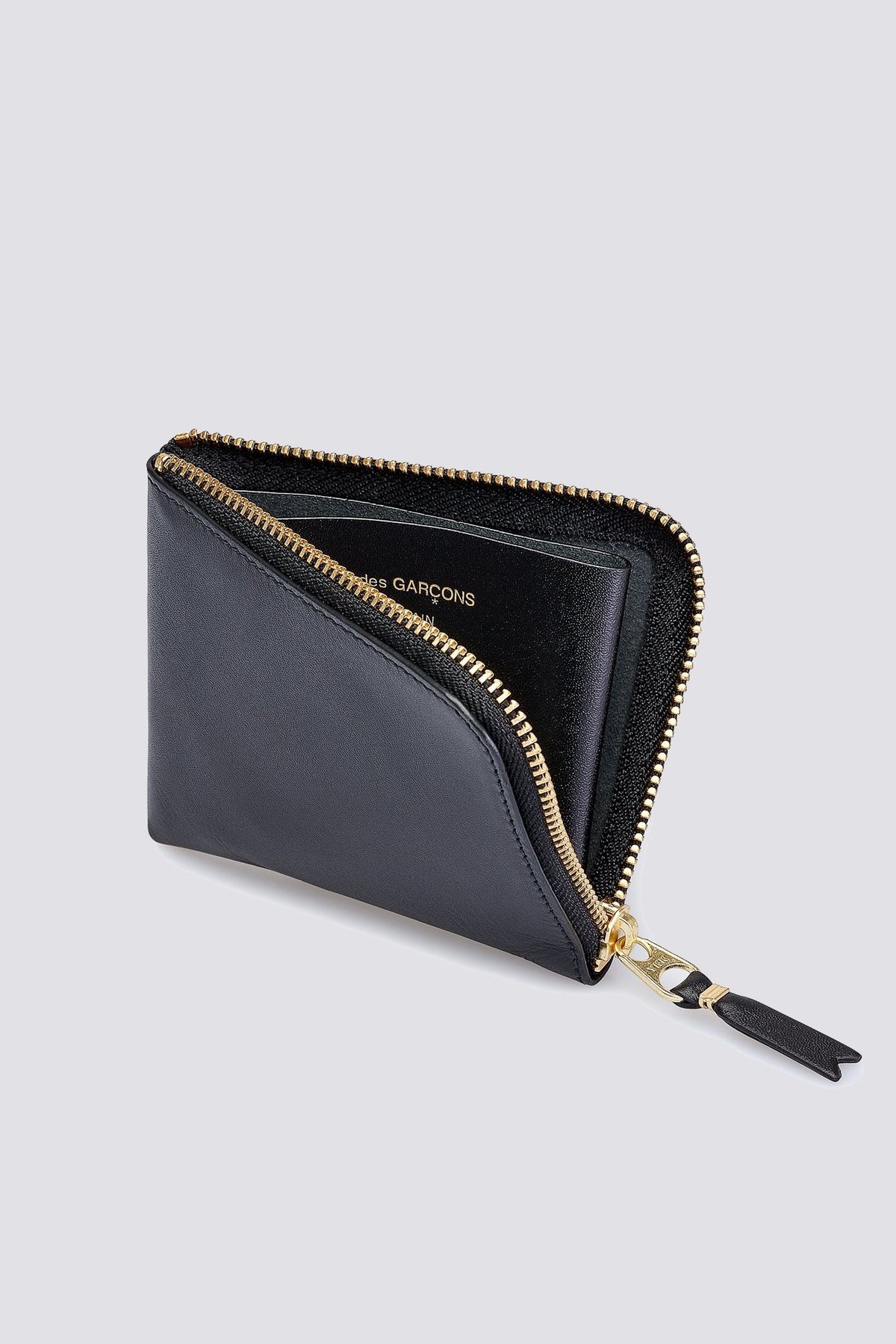 折りたたみ財布 Comme Des Garcons Wallet Small Clutch With Zipper COMME des GARCONS Small Zip Wallet in Brown | FWRD