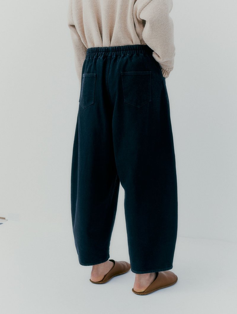 Cordera Curved Leg Pants - Black Denim | Garmentory